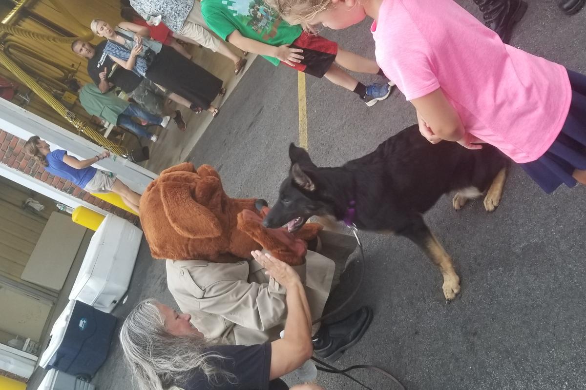 McGruff the Crime Dog meets a friend at 2018 National Night Out