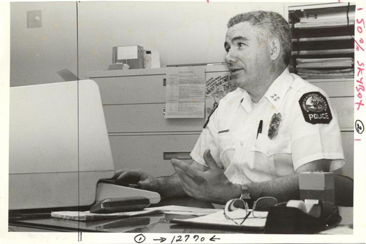 Newspaper photo - Officer at computer