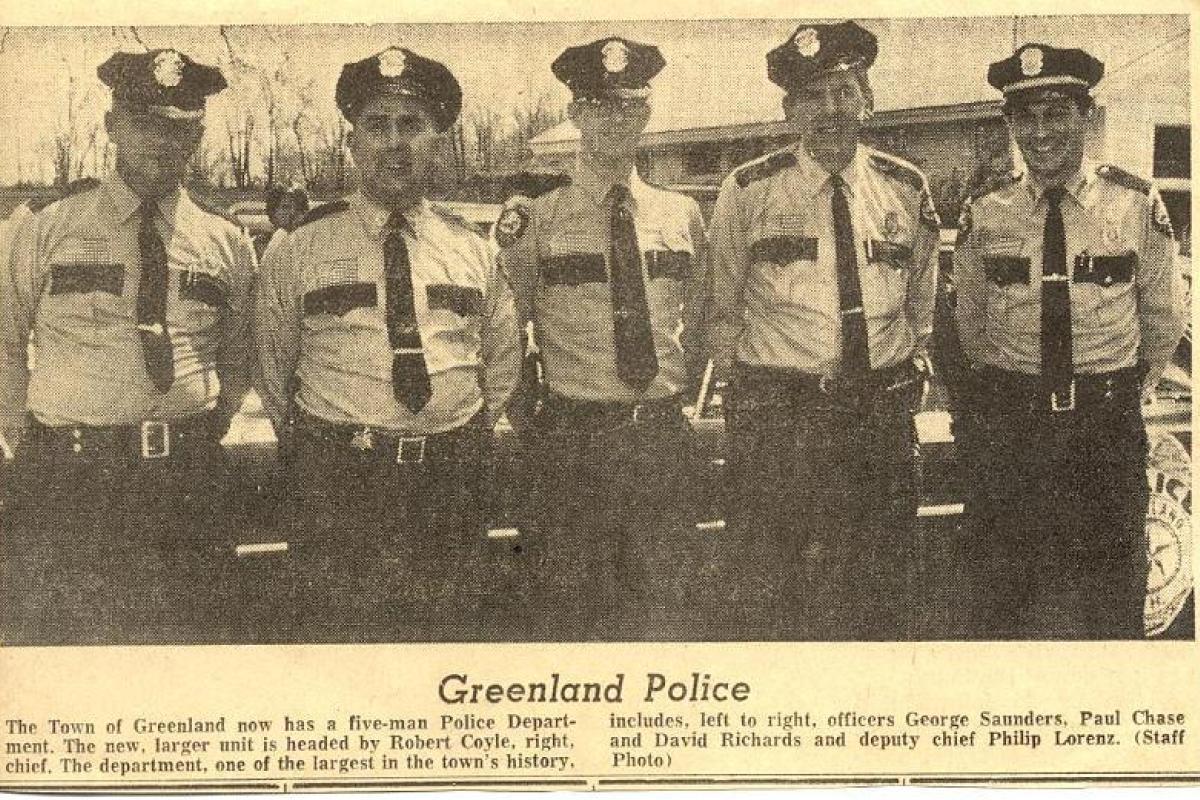 Newspaper photo of Police staff