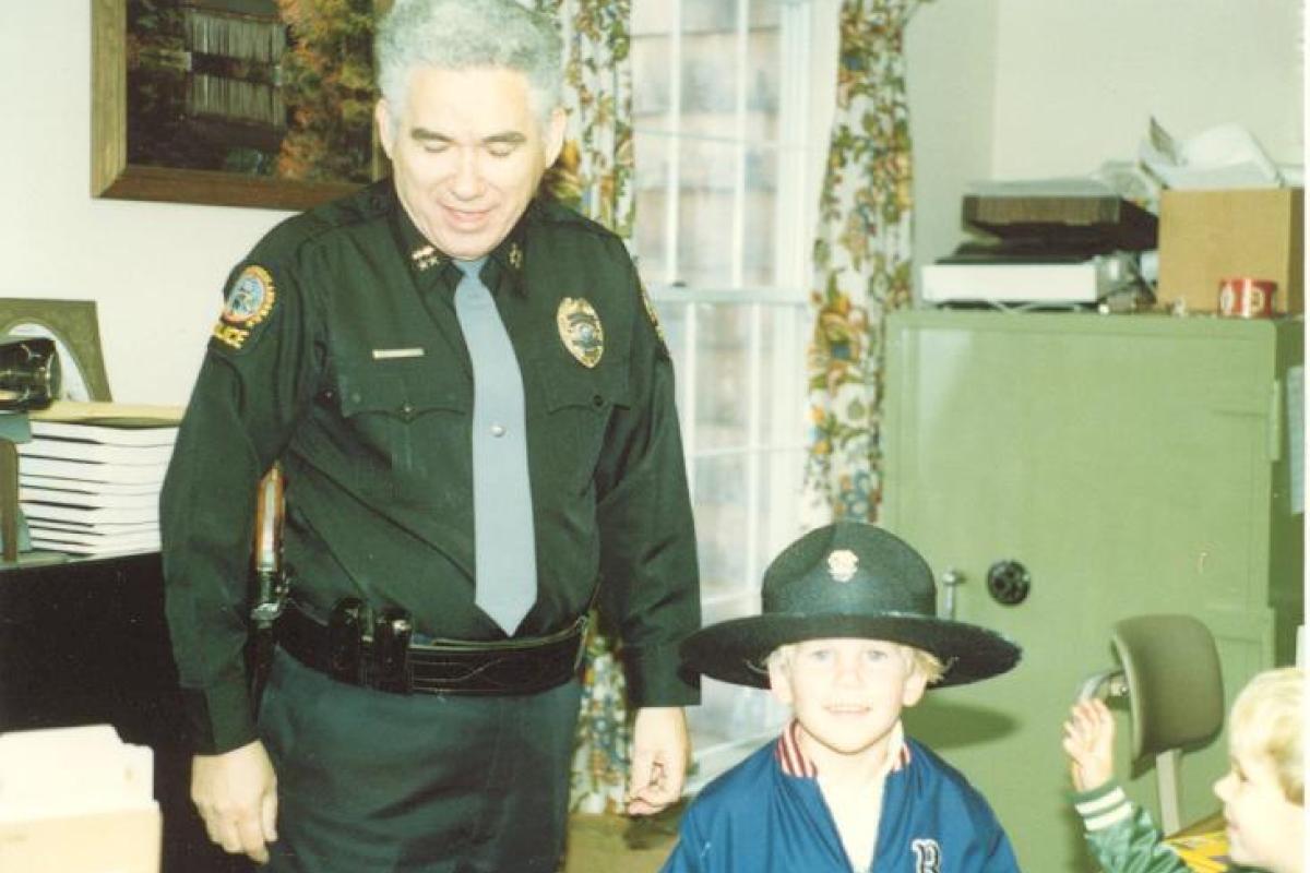 Photo of officer with young boy